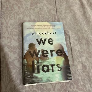 We were liars hardcover with sleeve 
By e. Lockhart